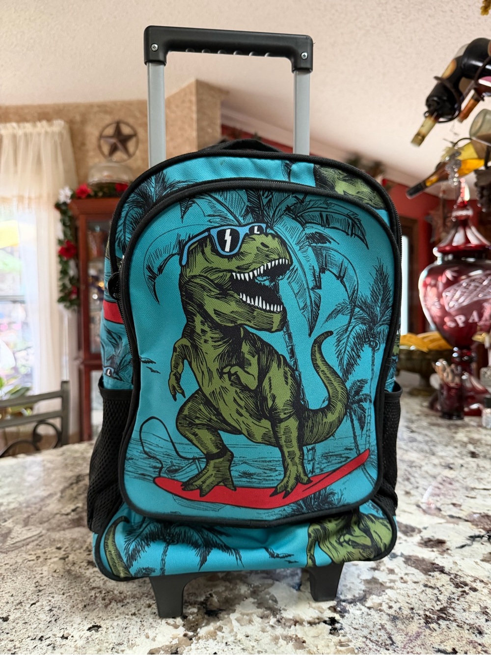 Blue Kids Rolling Backpack with Green T-Rex Surf Design